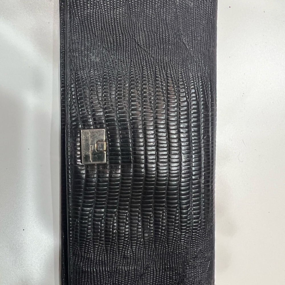Salvatore Ferragamo textured wallet.